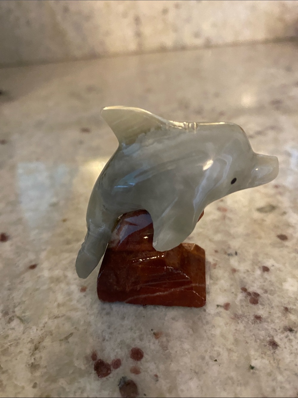 Stone dolphin figure. NWT about 1.5x2.5 in. Summer